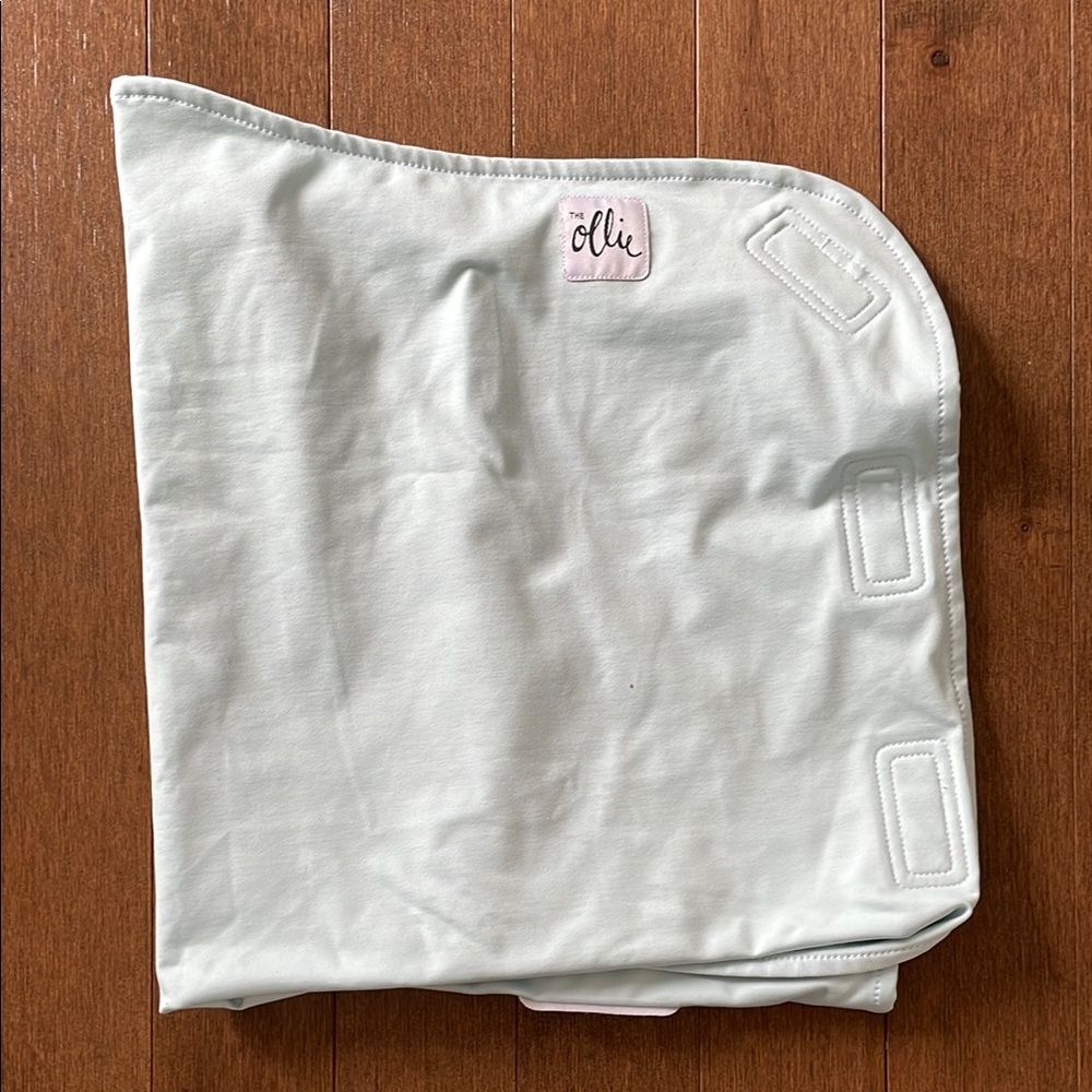Ollie newborn swaddle in sky